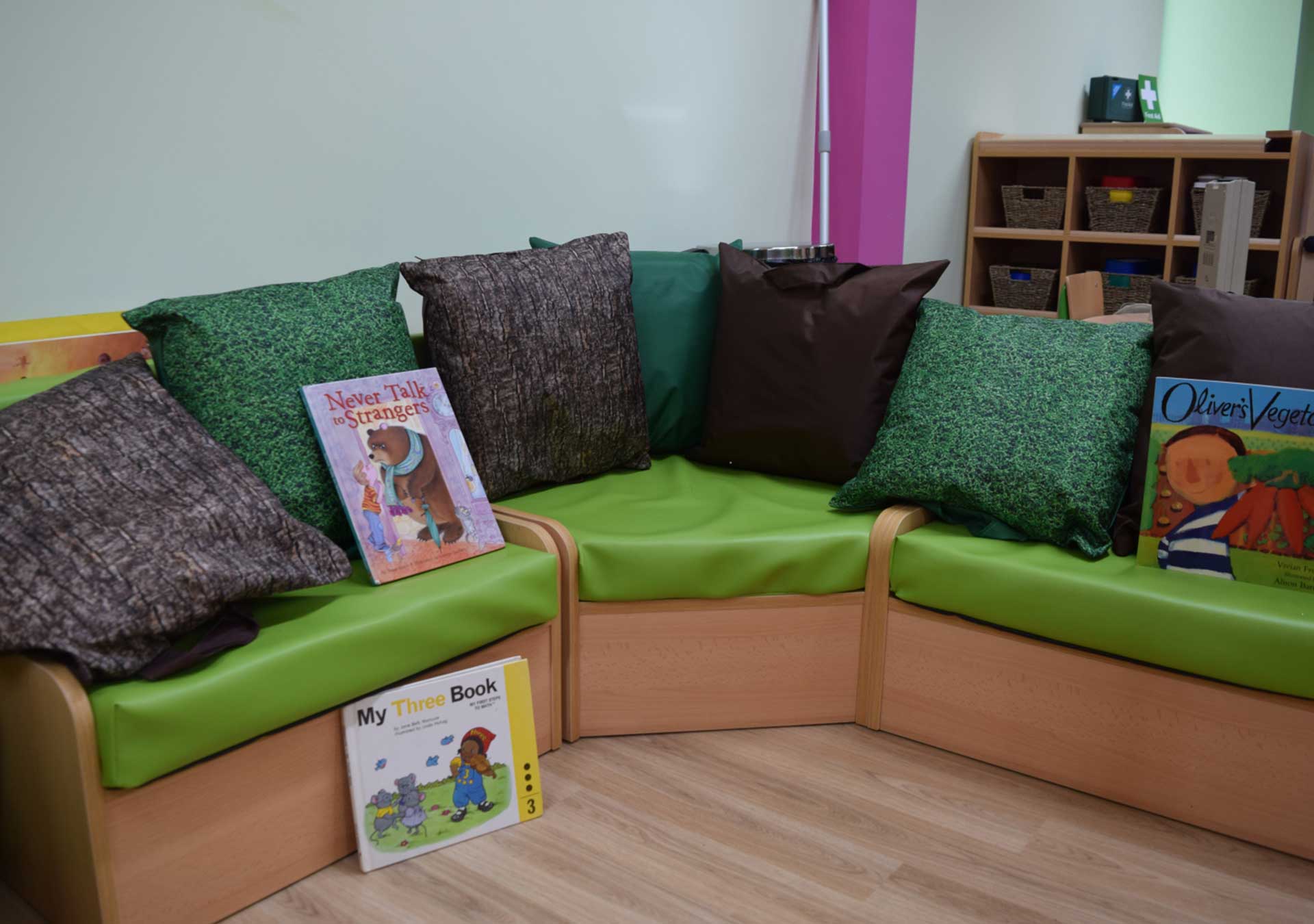 Reading corner with cushions and picture books